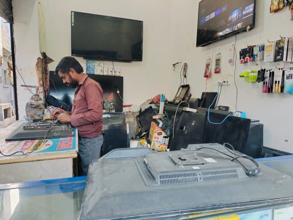 Experienced technician performing Onida TV Repair